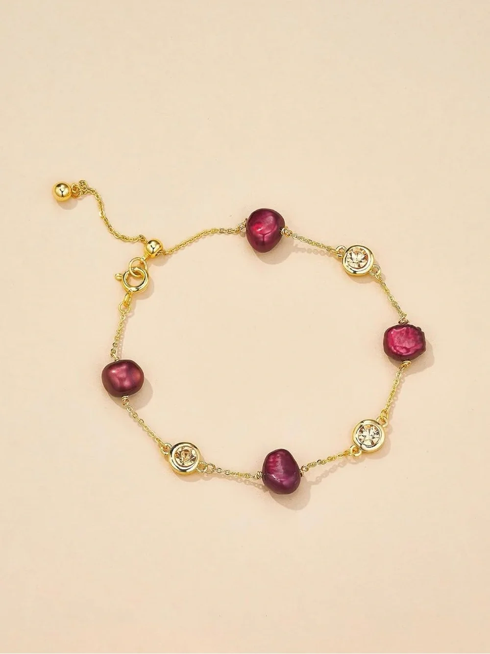 NEW 18k Gold Plated Chain Bracelet with Burgundy Pearls and Champagne Crystal.